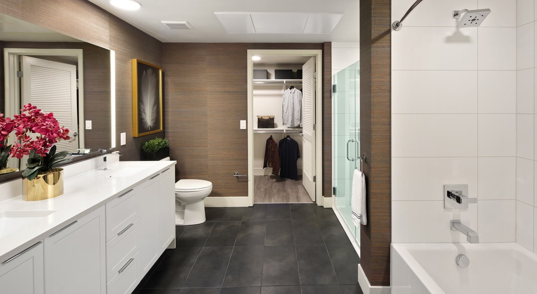 Large, luxurious bathroom with walk-in closet 